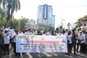 Implementasi Perwal Nomor 19,Distrik Japut Bagi Masker di Dua Tempat
