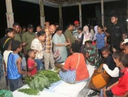 BTM Borong Sayur di Pasar Kampung Bupati Keerom Yang Tanpa Penerangan, Pedagang Hanya Pakai Lilin